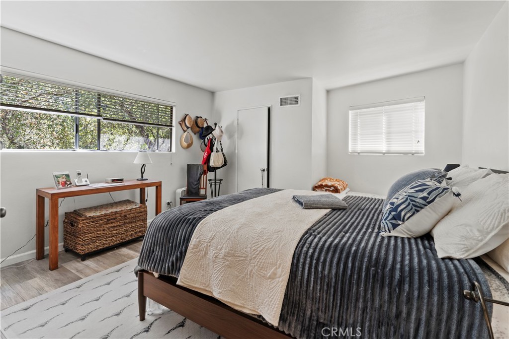 4214 Tosca Road Woodland Hills, CA 91364 - Photo 13 of 24 a bedroom with a bed and a window