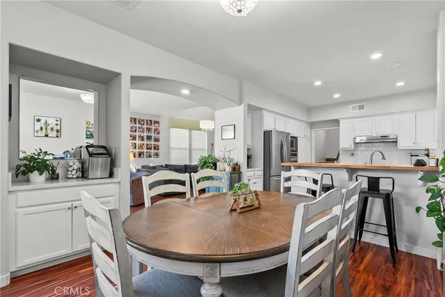 a view of kitchen dining table and chairs