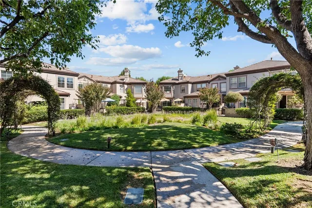 a view of a street with a building in the background