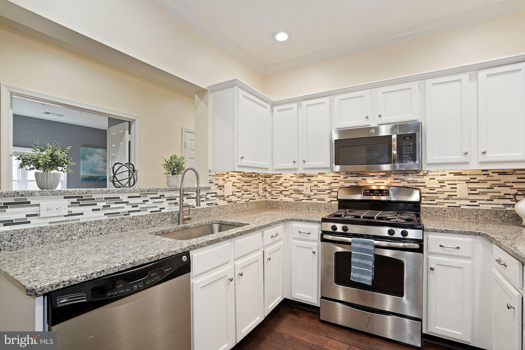 12016 Taliesin Place, Unit 26 Reston, VA 20190 - Photo 4 of 29 Upgraded Kitchen