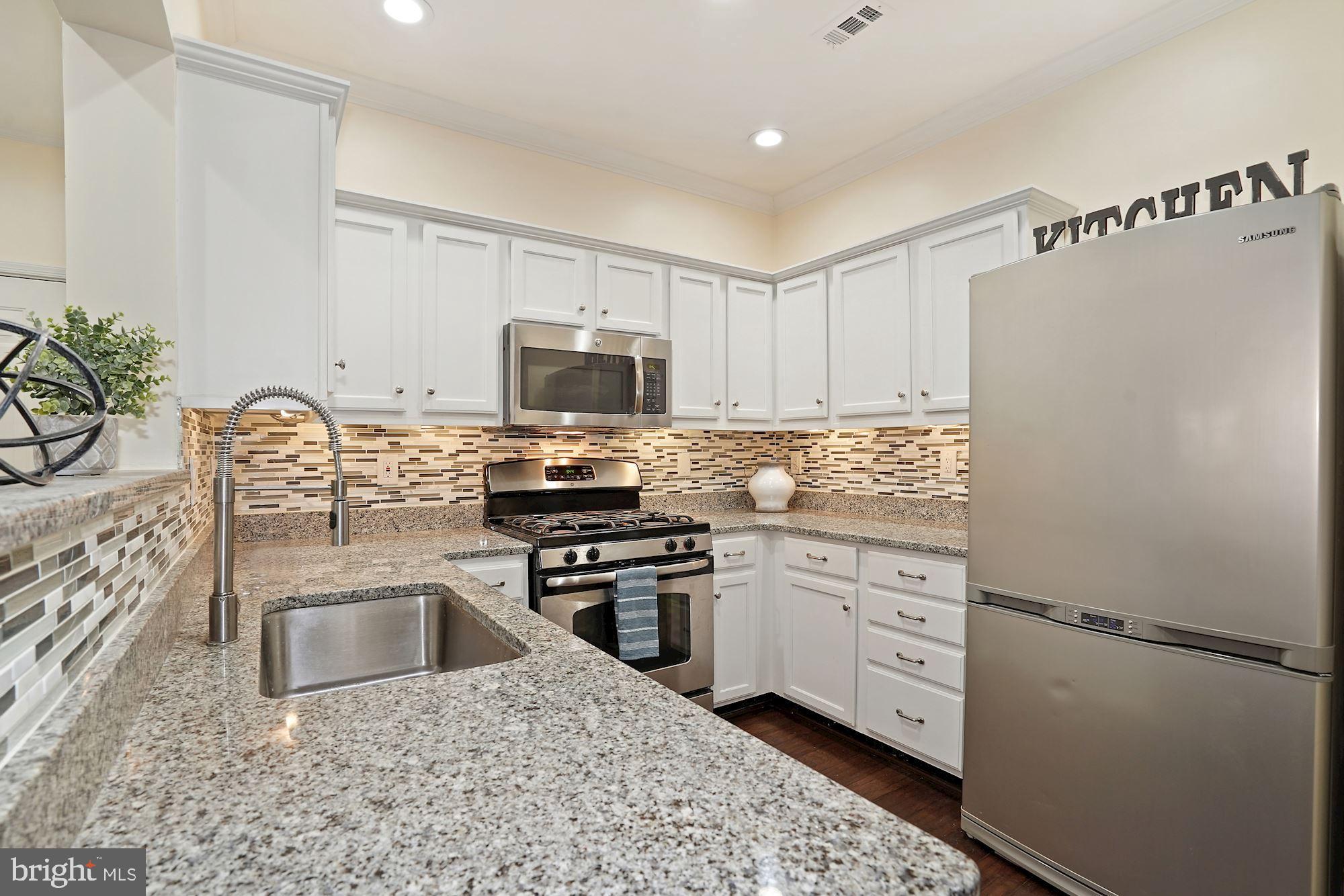 12016 Taliesin Place, Unit 26 Reston, VA 20190 - Photo 5 of 29 Spacious Kitchen