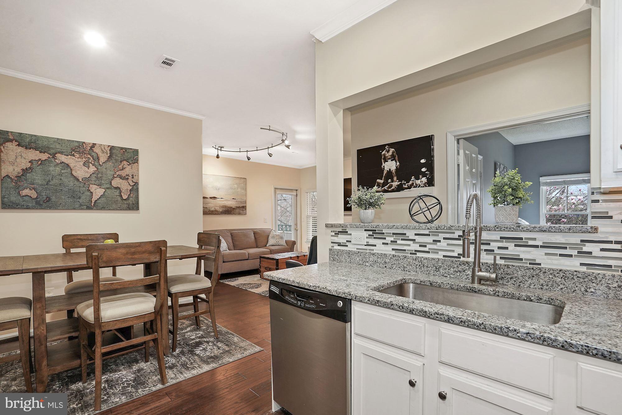 12016 Taliesin Place, Unit 26 Reston, VA 20190 - Photo 6 of 29 Kitchen opens to Dining Area