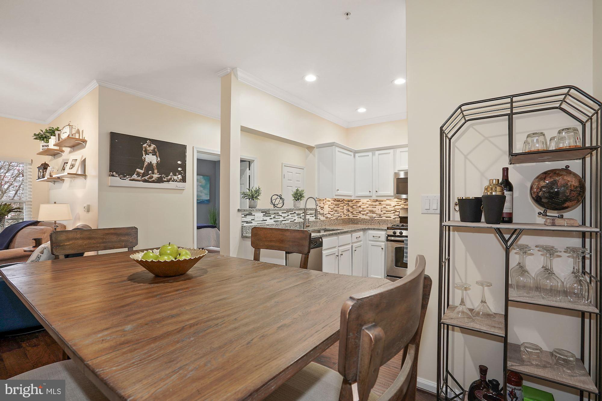 12016 Taliesin Place, Unit 26 Reston, VA 20190 - Photo 7 of 29 Dining area