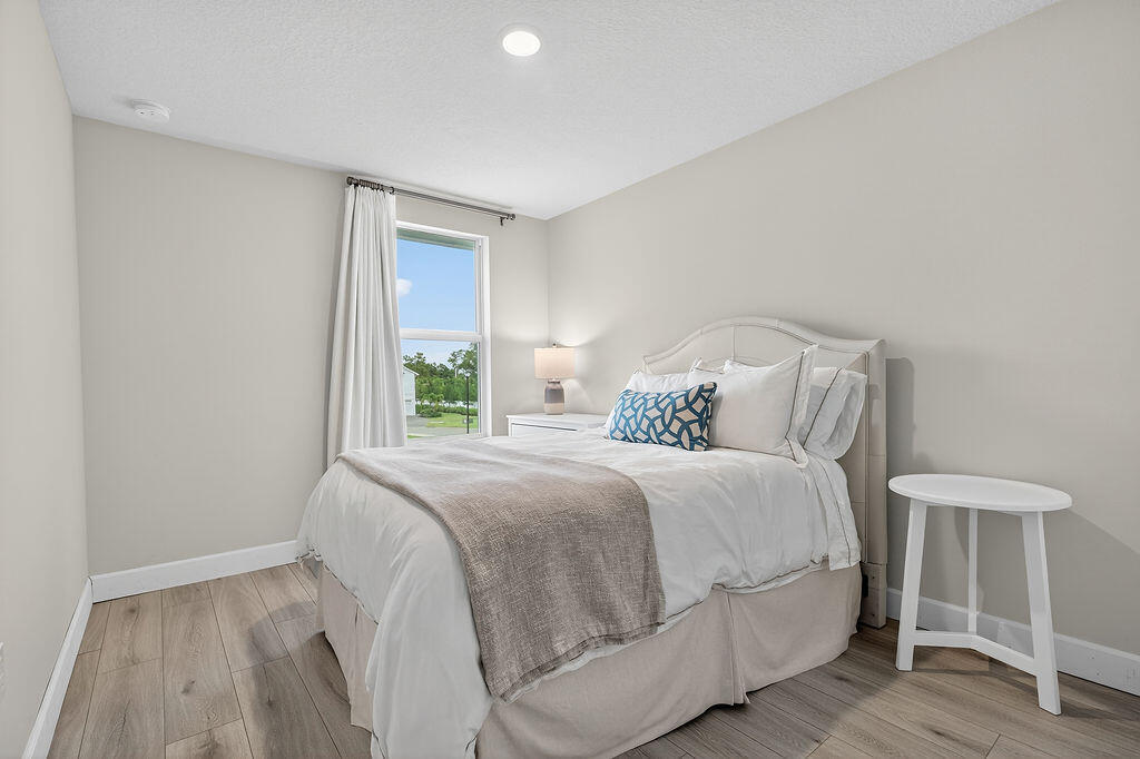 5696 Southeast Edgewater Circle Stuart, FL 34997 - Photo 14 of 29 Guest Bedroom