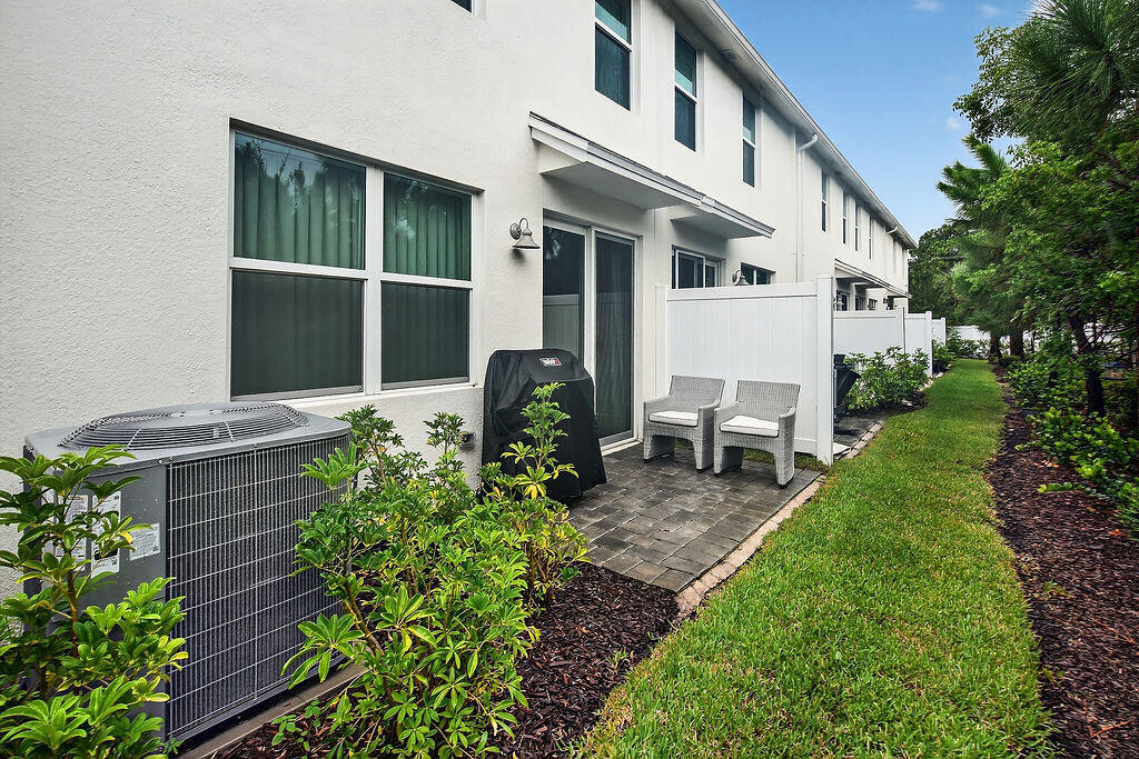 5696 Southeast Edgewater Circle Stuart, FL 34997 - Photo 23 of 29 Back of home