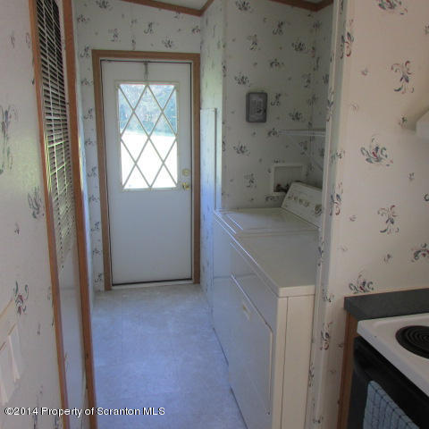 2000 Booth Road Hallstead, PA 18822 - Photo 7 of 15 a bathroom with a sink and a tub
