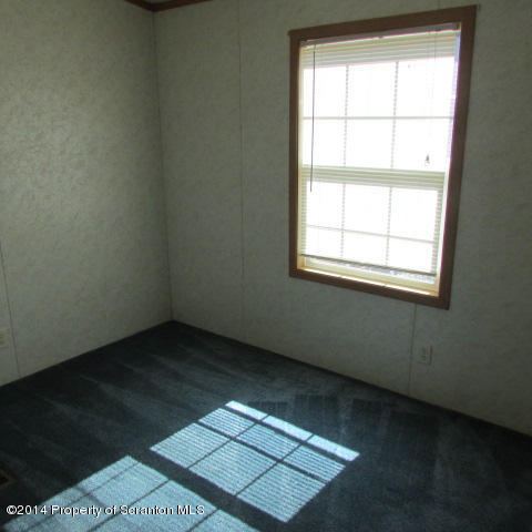 2000 Booth Road Hallstead, PA 18822 - Photo 9 of 15 an empty room with a window