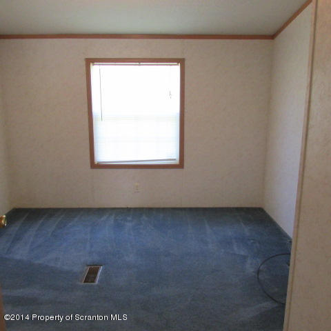 2000 Booth Road Hallstead, PA 18822 - Photo 10 of 15 an empty room with a window