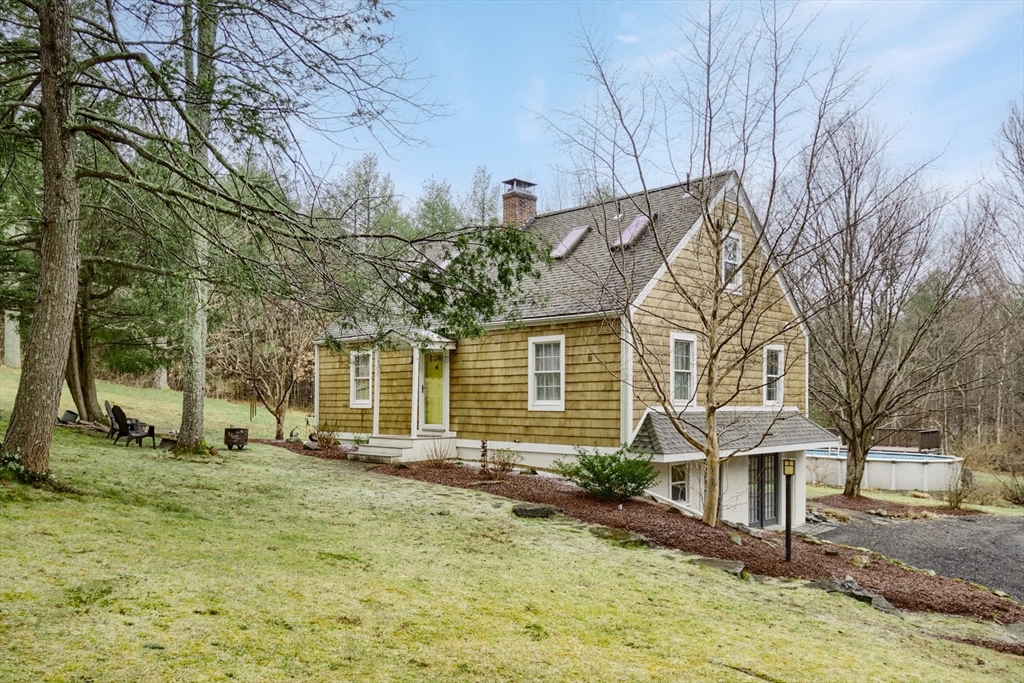 183 Sterling Road Princeton, MA 01541 - Photo 1 of 35 a front view of a house with a yard