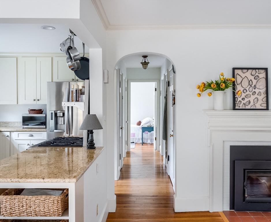 183 Sterling Road Princeton, MA 01541 - Photo 11 of 35 a kitchen with granite countertop a stove and white cabinets