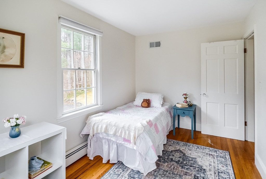 183 Sterling Road Princeton, MA 01541 - Photo 14 of 35 a bedroom with a bed and a window