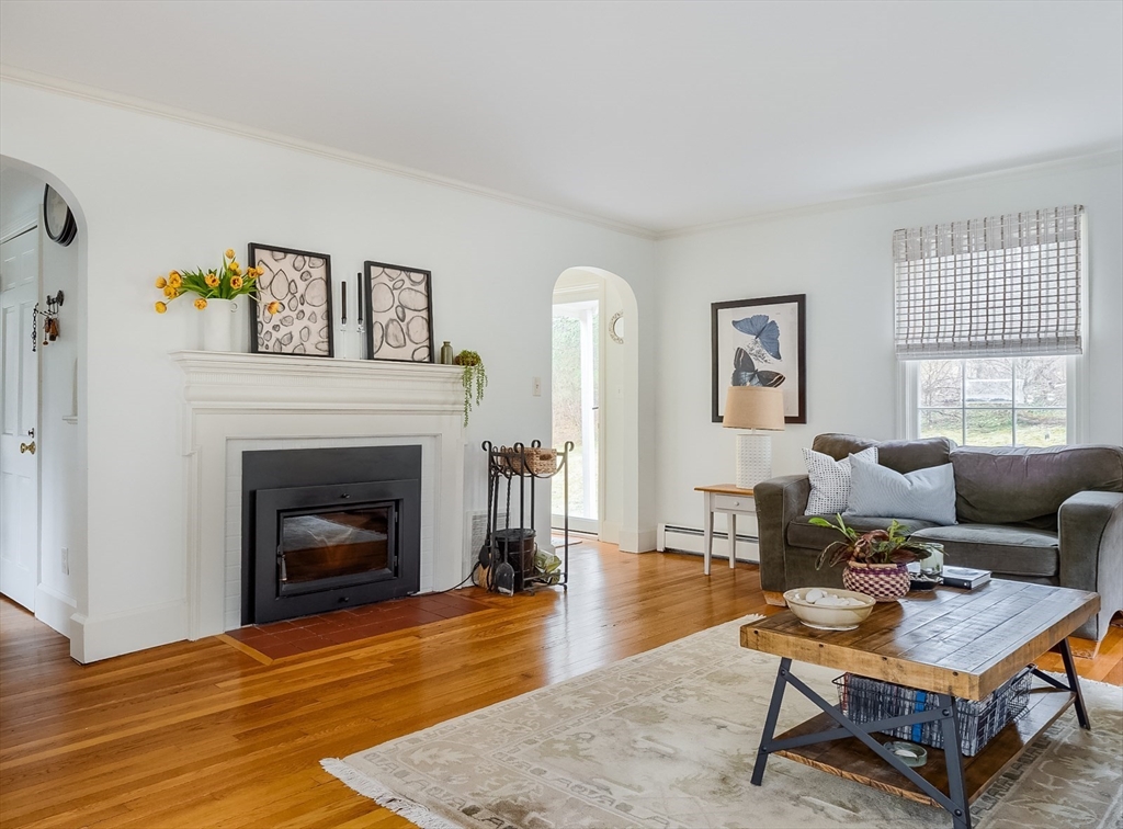 183 Sterling Road Princeton, MA 01541 - Photo 2 of 35 a living room with furniture a fireplace and wooden floor