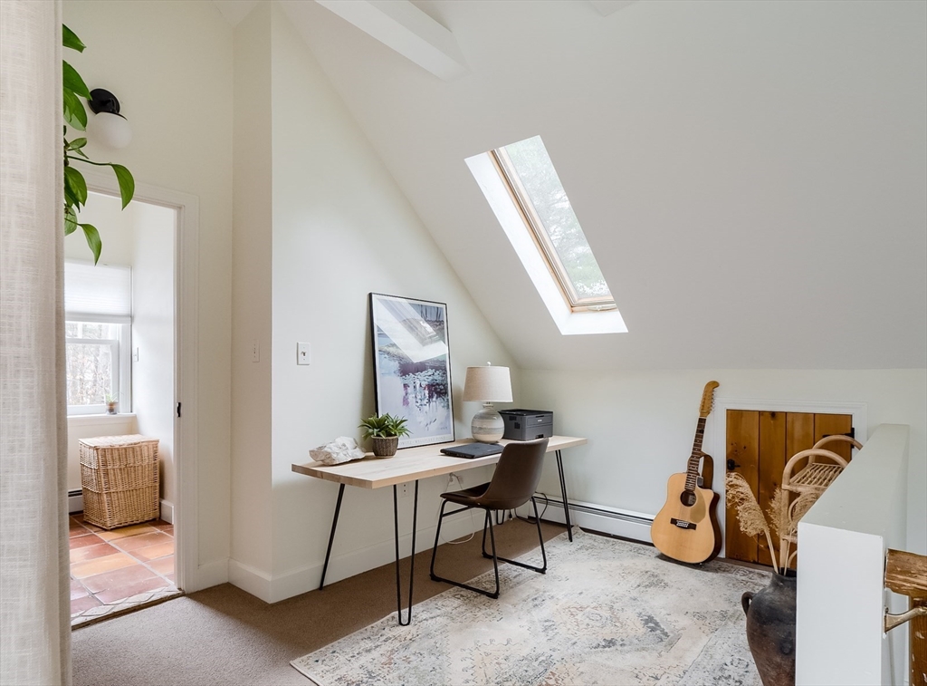 183 Sterling Road Princeton, MA 01541 - Photo 22 of 35 a room with gym equipment and a view of living room