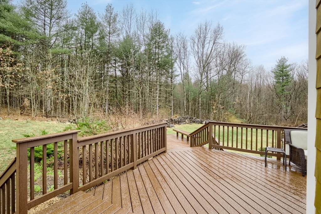 183 Sterling Road Princeton, MA 01541 - Photo 29 of 35 a view of a wooden balcony with trees