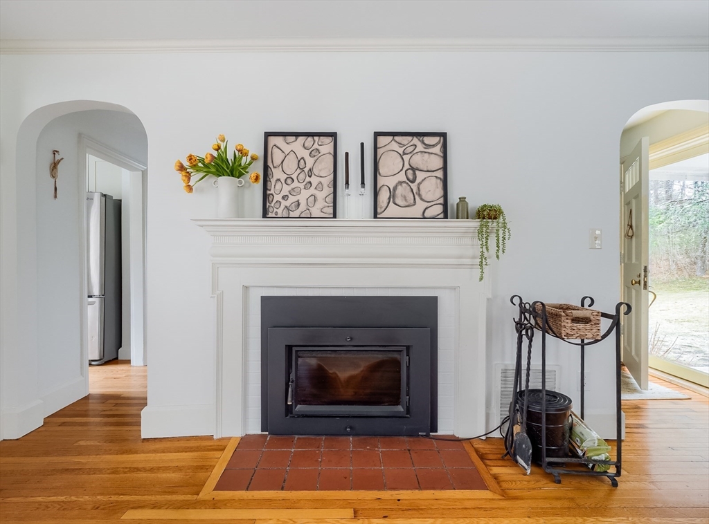 183 Sterling Road Princeton, MA 01541 - Photo 3 of 35 a living room with furniture and a fireplace
