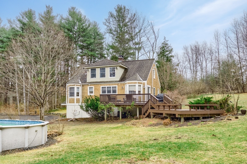 183 Sterling Road Princeton, MA 01541 - Photo 33 of 35 a front view of a house with garden