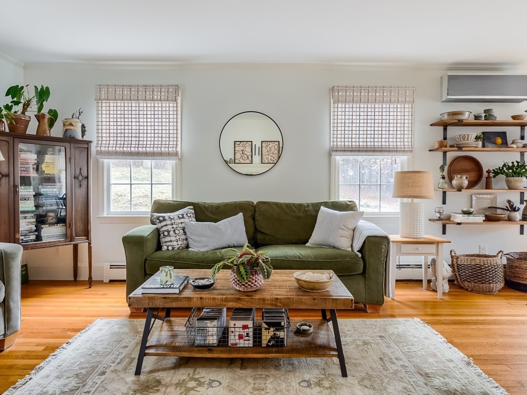 183 Sterling Road Princeton, MA 01541 - Photo 4 of 35 a living room with furniture a rug and a window