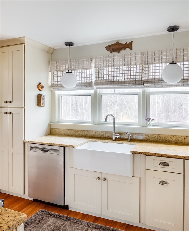 183 Sterling Road Princeton, MA 01541 - Photo 7 of 35 a kitchen with stainless steel appliances granite countertop a sink and a white cabinets