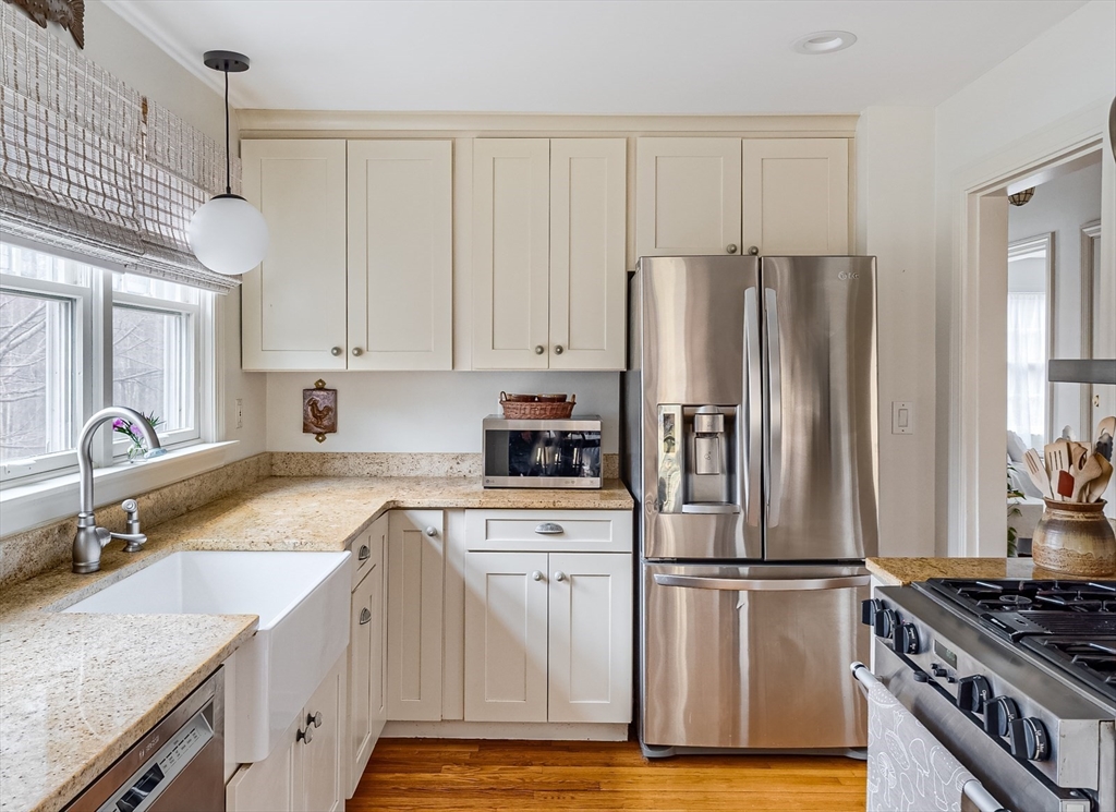 183 Sterling Road Princeton, MA 01541 - Photo 8 of 35 a kitchen with granite countertop a refrigerator stove and sink
