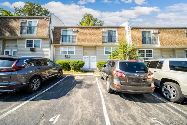 a car parked in front of a house