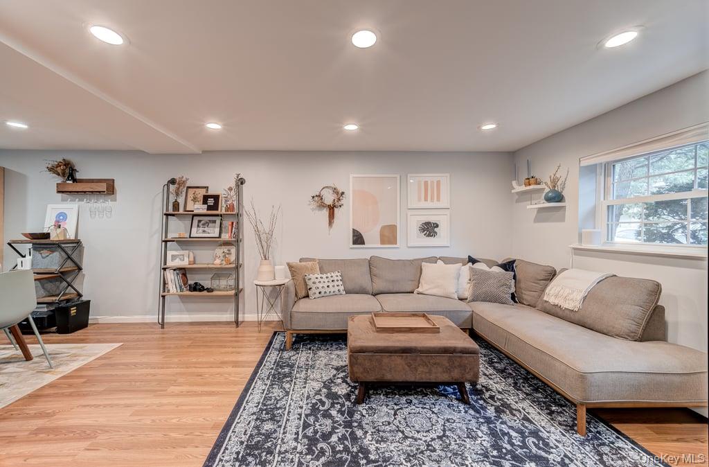 4 Forge Gate Drive, Unit F3 Cold Spring, NY 10516 - Photo 2 of 20 a living room with furniture and wooden floor