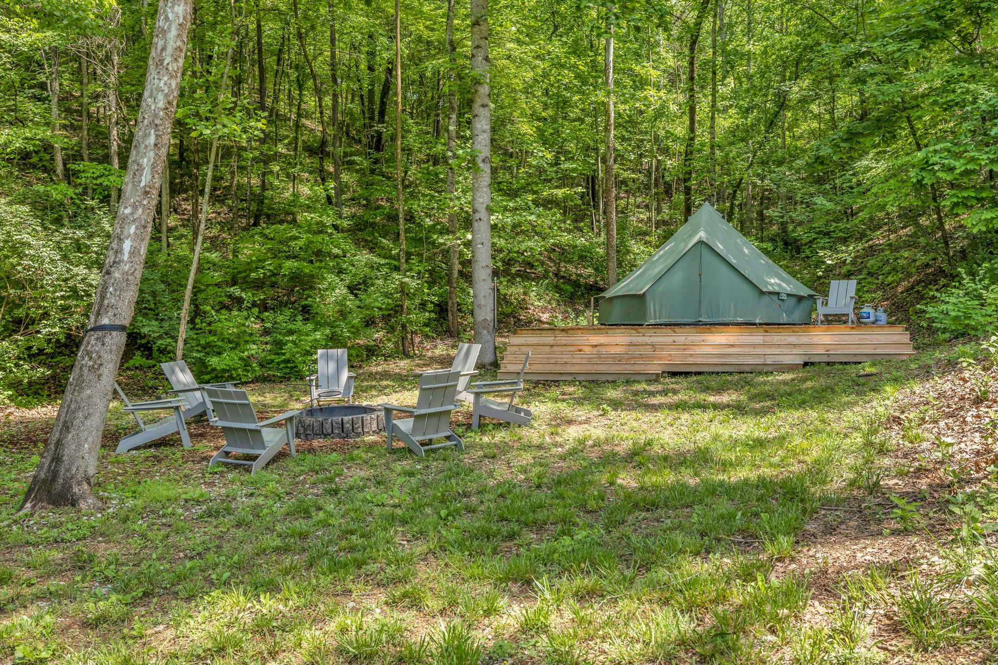 8515 Cub Creek Road Nashville, TN 37209 - Photo 7 of 23 a view of a backyard with table and chairs and wooden fence