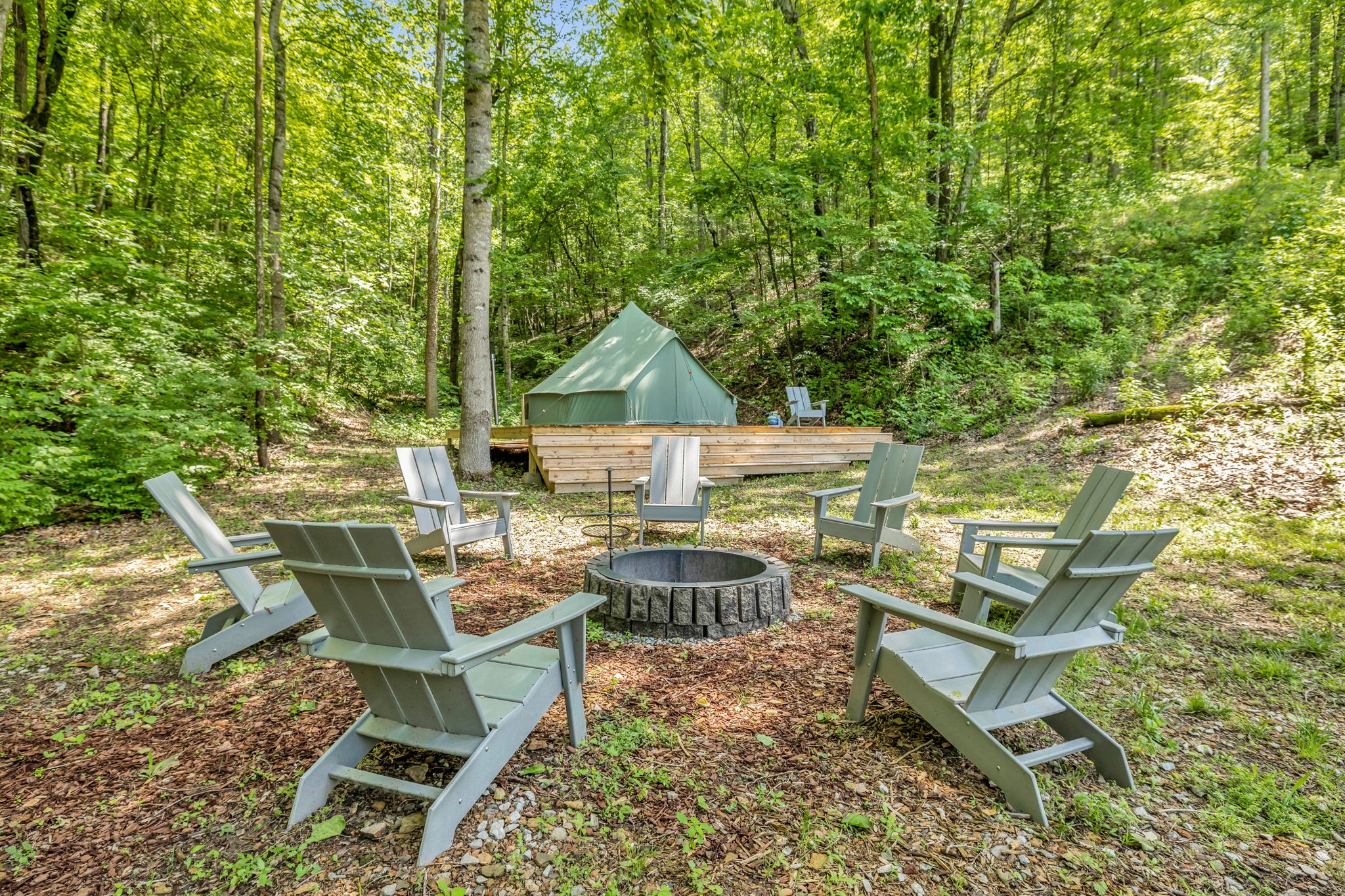 8515 Cub Creek Road Nashville, TN 37209 - Photo 9 of 23 a view of a patio with table and chairs and wooden floor