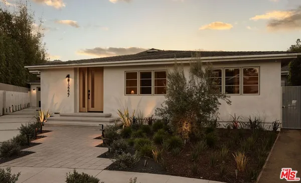 a house that has a lot of windows in it