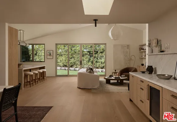 a room with furniture and a large window