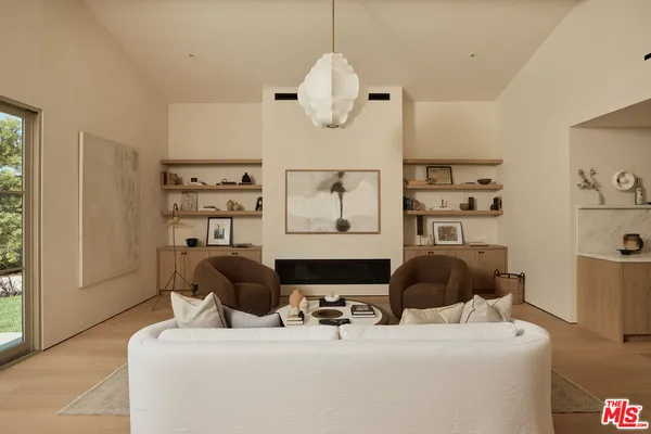 a bedroom with furniture a bed and a window