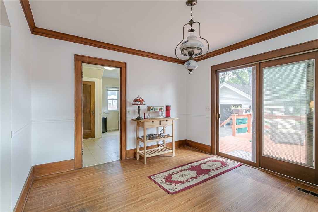 99 Wimbledon Road Irondequoit, NY 14617 - Photo 8 of 20 LR flows into the dining room