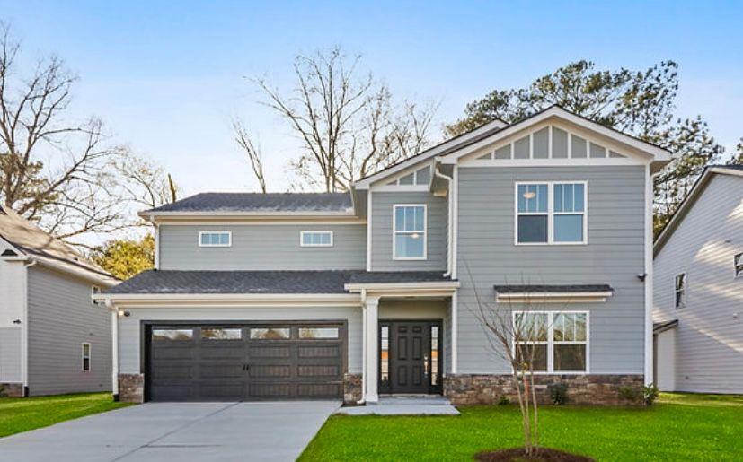 2458 Mills Bend Decatur, GA 30034 - Photo 1 of 1 a front view of a house with garden