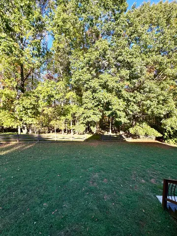 a view of a yard in front of a house