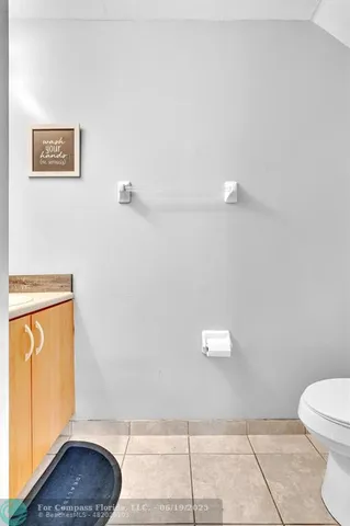 a bathroom with a sink a vanity and mirror