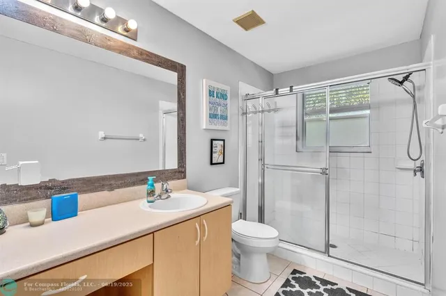 a patio with a table and chairs