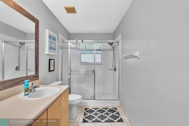 an outdoor space with furniture and umbrella