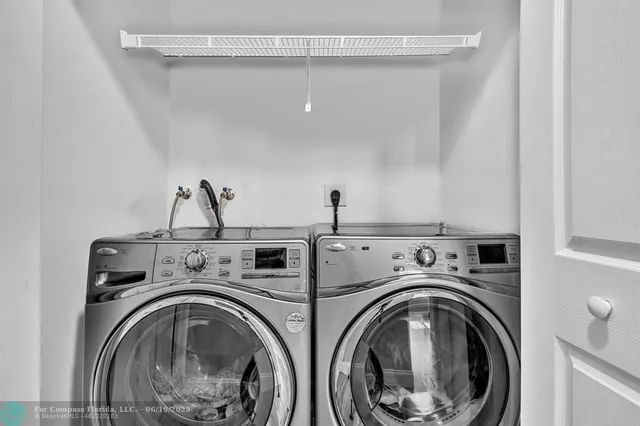 a patio with a table and chairs