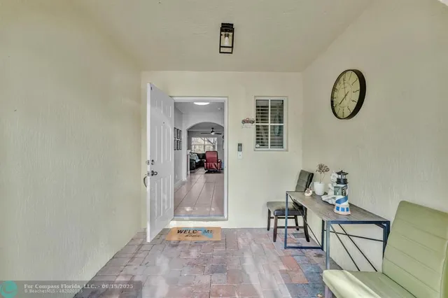 a view of a livingroom with furniture and wooden floor