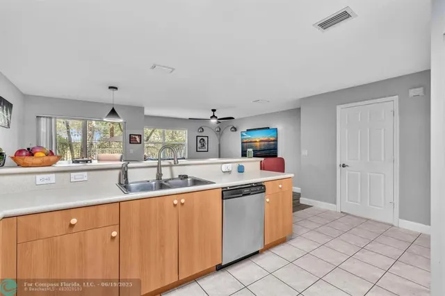 a view living room with furniture and flat screen tv