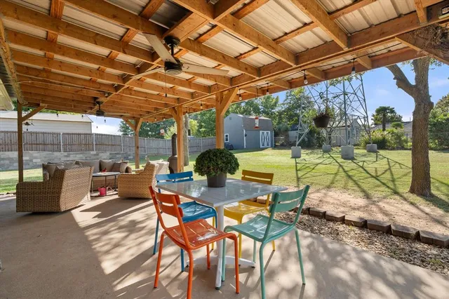 a view of swimming pool with a patio