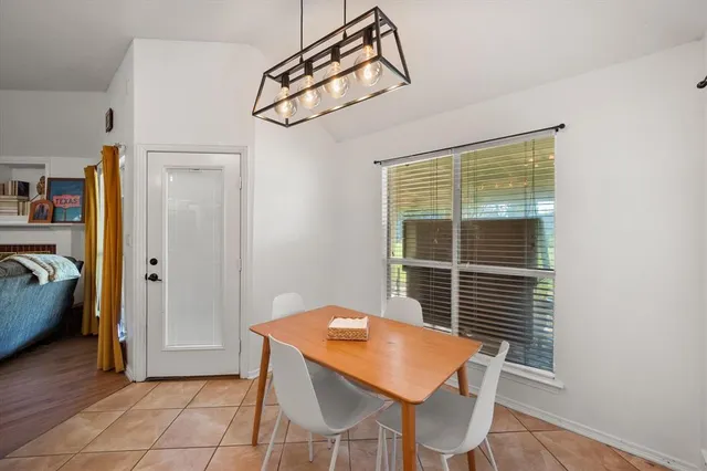 a view of a livingroom with furniture and window