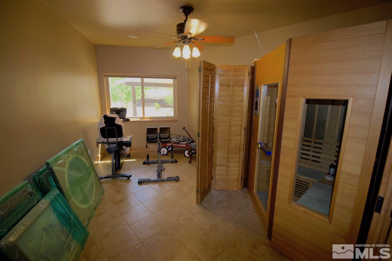 1235 Antelope Valley Road Reno, NV 89508 - Photo 23 of 35 a view of a livingroom with workspace and a window