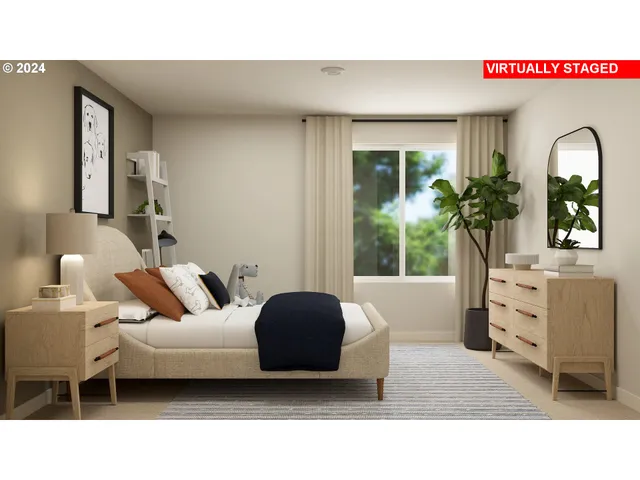 a living room with furniture a window and potted plants