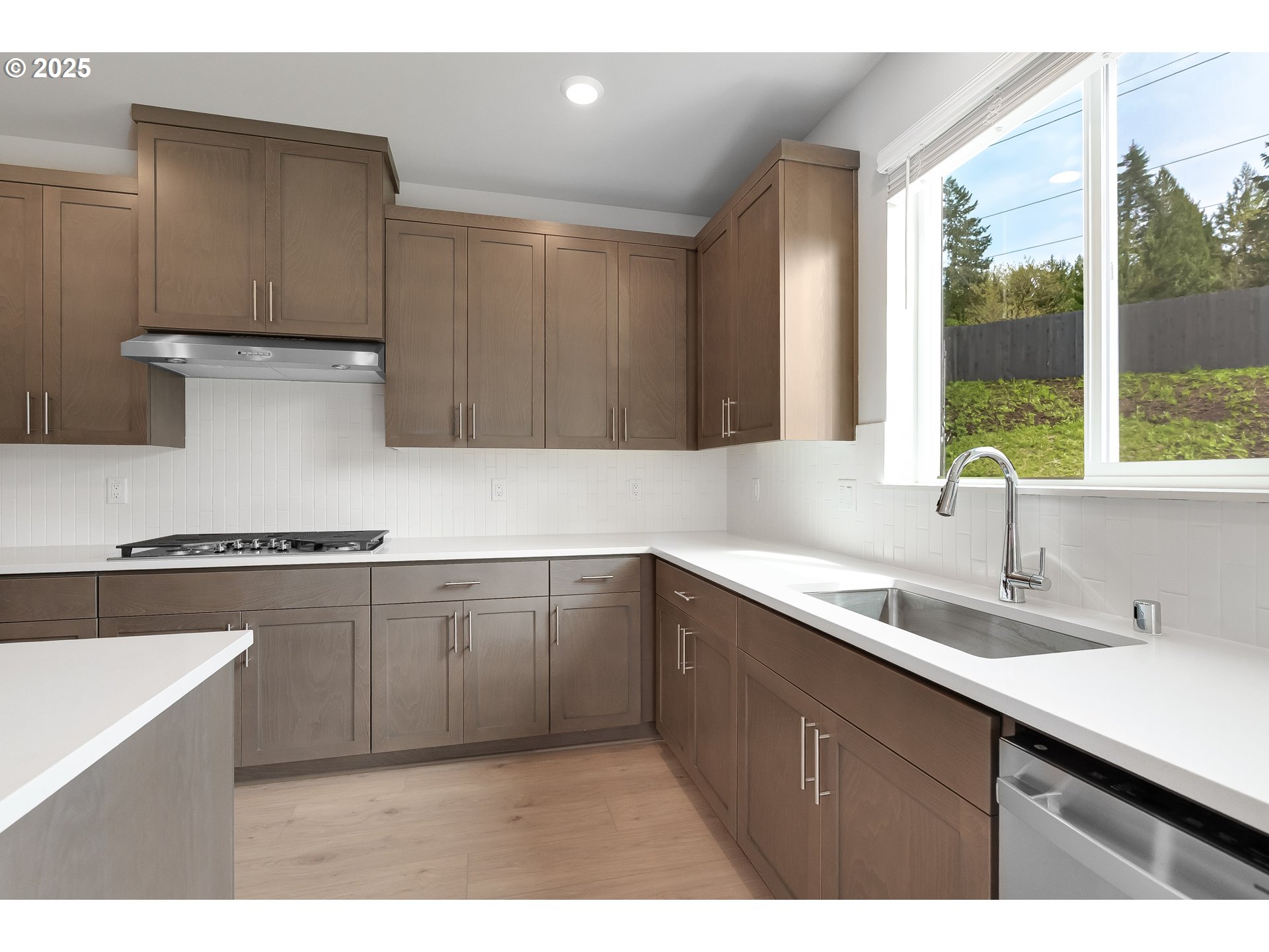 3608 Northeast 170th Street Vancouver, WA 98686 - Photo 26 of 26 a kitchen with a sink and cabinets
