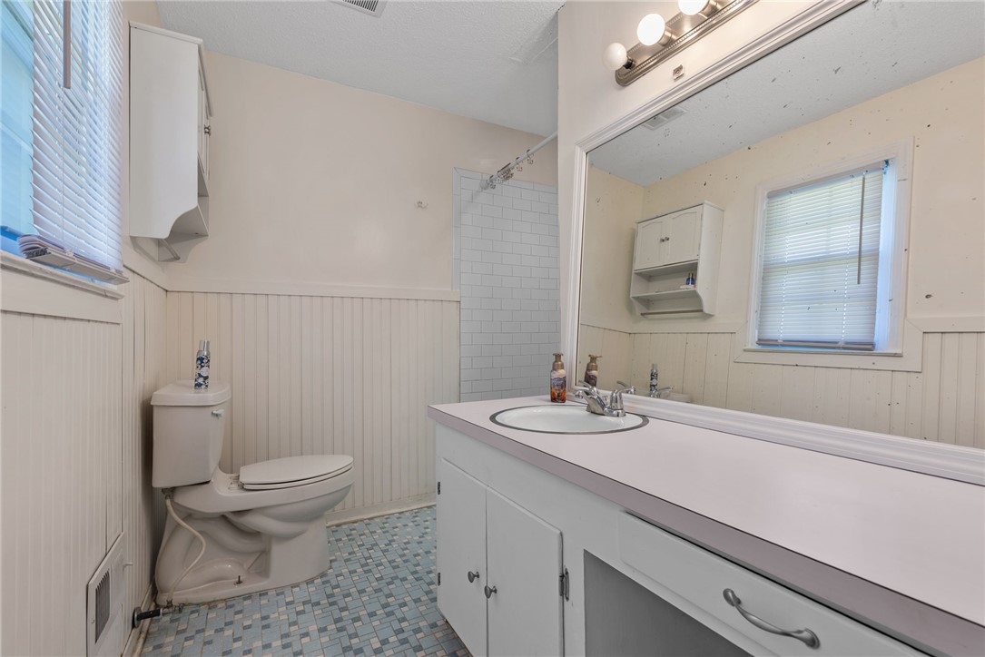 300 Green Street Williamston, SC 29697 - Photo 15 of 47 This clean bathroom features a spacious vanity and ample storage.