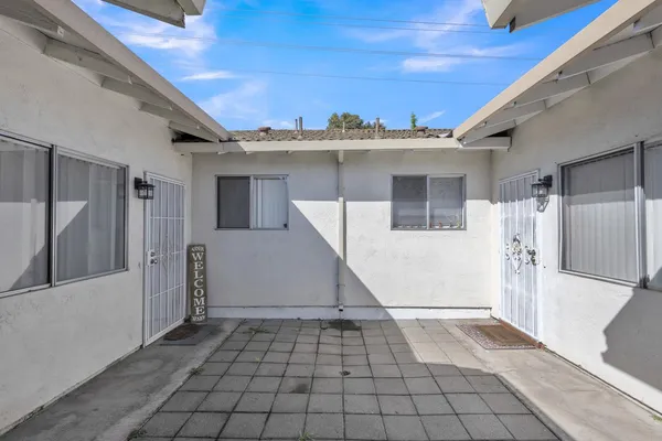 a view of a house with a white door
