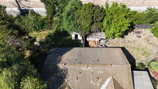 a view of a yard in front of house