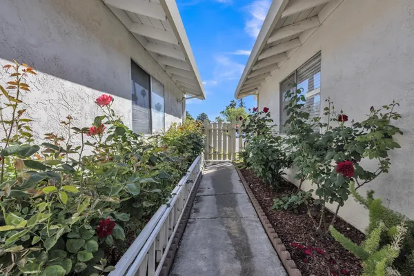 a view of entryway with flower pots