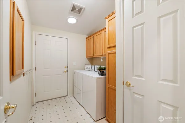 a view of a storage & utility room with closet