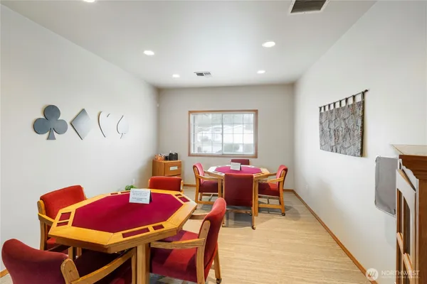 a room with furniture and a flat screen tv